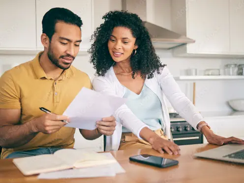 A couple gathering financial documents